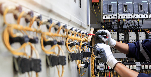 Professional Electrician technician working in Van Meter, IA